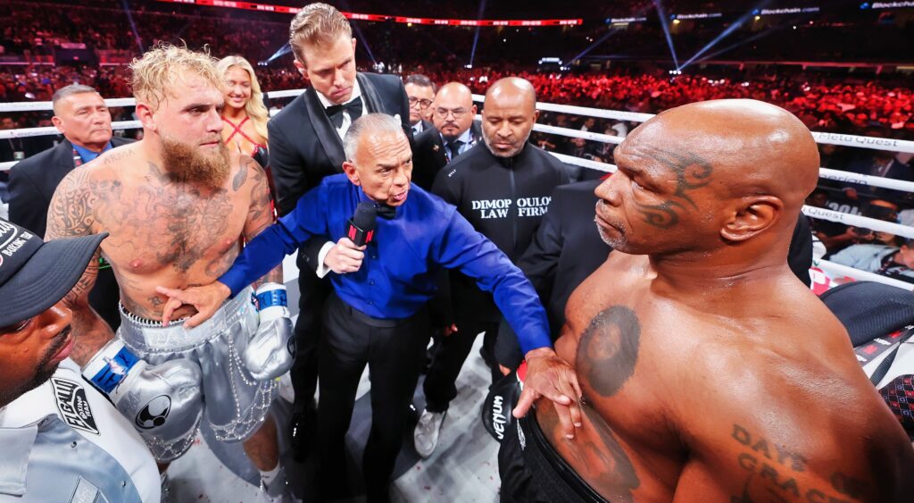 Jake Paul and Mike Tyson square off before their fight.