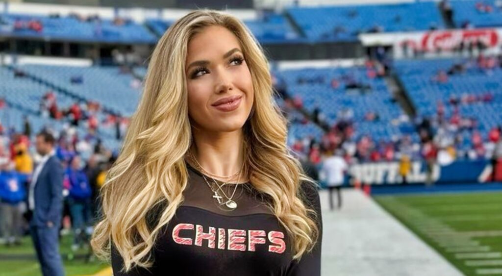 Gracie Hunt posing on football field