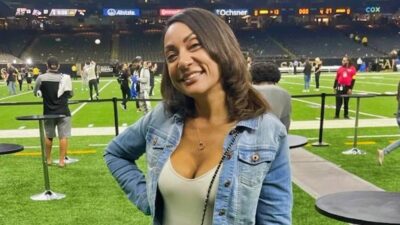 Jayden Daniels mom posing on field