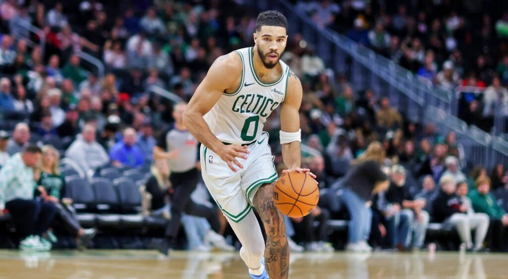 Jayson Tatum of the Boston Celtics handles the ball during a game against the Milwaukee Bucks at Fiserv Forum on November 10, 2024