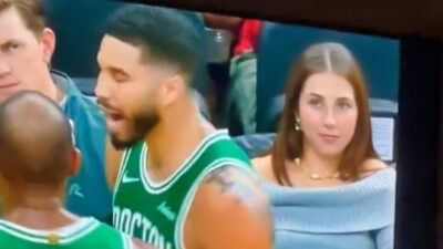 Jayson Tatum and Celtics fan staring at him