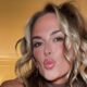 Jena Sims making kissy face to camera