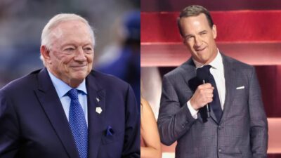 Jerry Jones smiling and Peyton Manning on stage at the CMAs