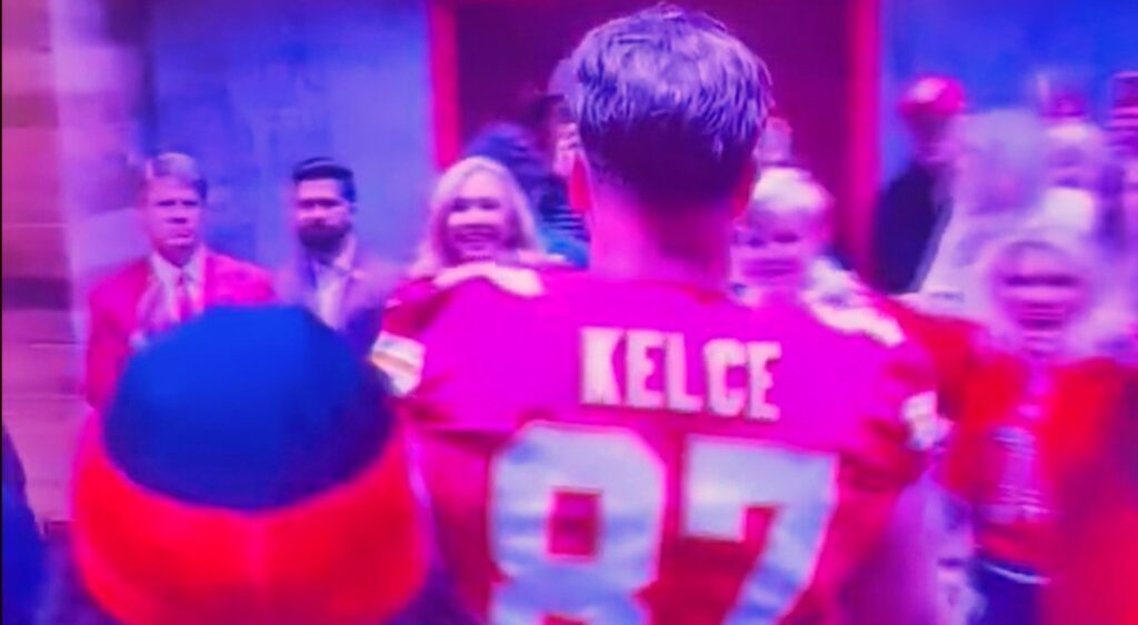 Travis Kelce walking to the locker room.