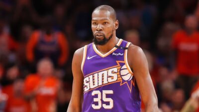 Kevin Durant of the Phoenix Suns reacts at a fan who criticized Suns superstar