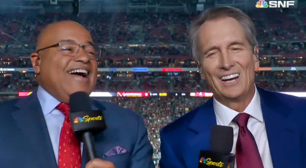 Mike Tirico and Cris Collinsworth laughing