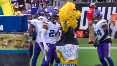 Minnesota Vikings and Jaguars mascot in end zone