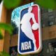 The NBA logo is seen outside an NBA fan store in New York