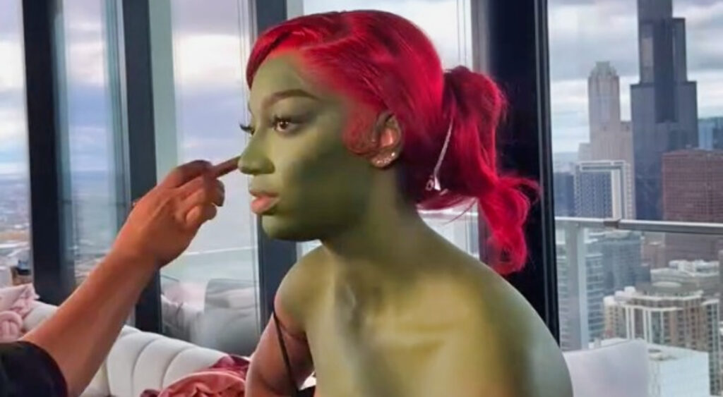 New Behind-The-Scenes Video Shows Angel Reese Sitting In Her Bra Getting Turned Into Poison Ivy For Halloween