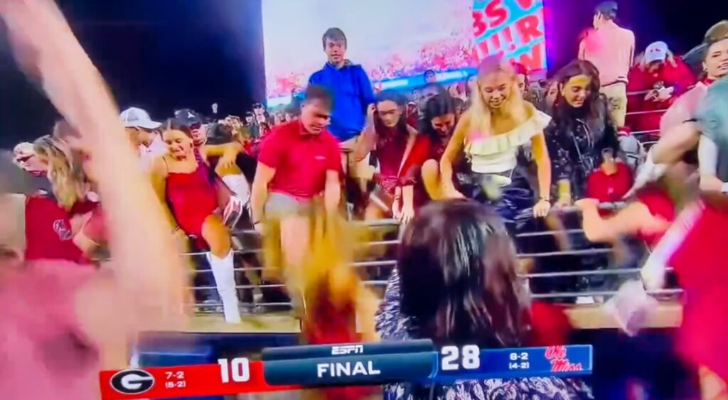 Ole Miss fan flipping off the camera