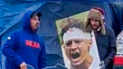 Bills fans with Patrick Mahomes sign