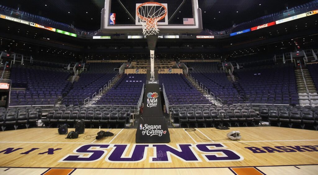 The Phoenix Suns logo is seen on the court before an NBA game