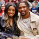 Olympic Gold medalist Simone Biles and Jonathan Owens of Chicago Bears pose for a photo during the first half between the Chicago Bulls and the Minnesota Timberwolves at the United Center on November 07, 2024 in Chicago, Illinois.