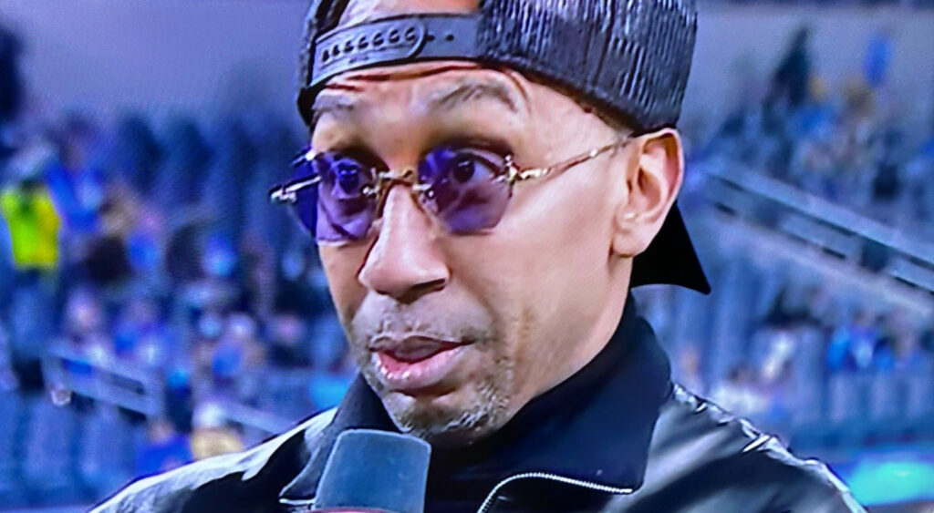 Stephen A Smith speaming into mic