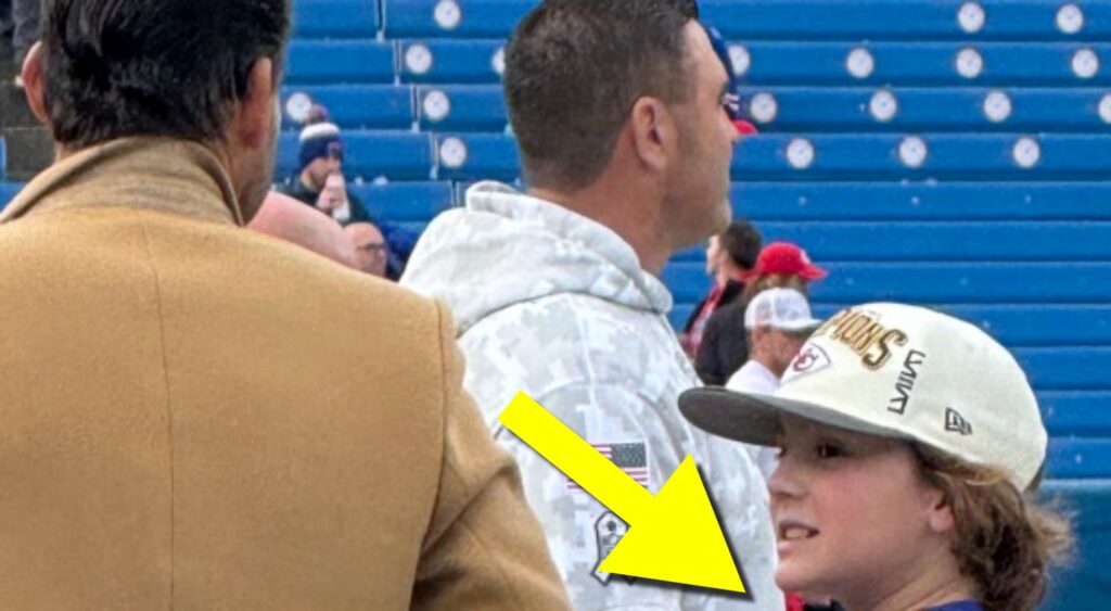 Tony Romo and his son at Bills-Chiefs game.