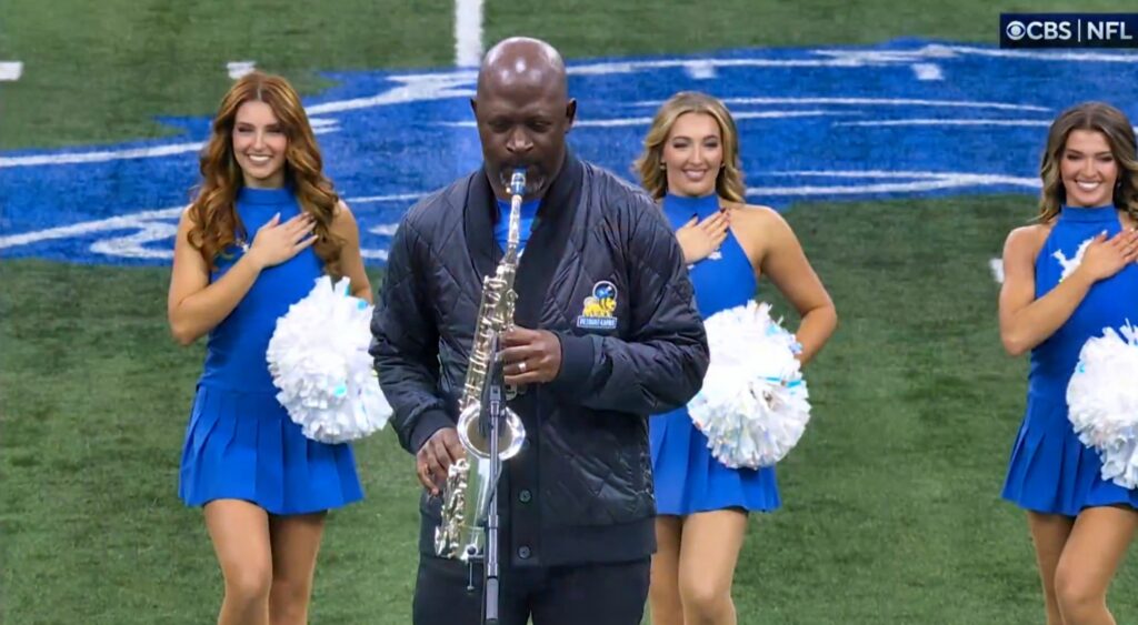 Mike Phillips of playing saxophone before Detroit Lions-Chicago Bears game.