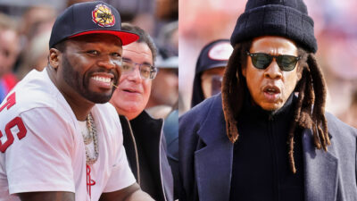 Photos of 50 Cent smiling & Jay-Z wearing sunglasses