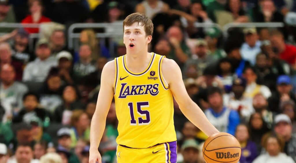 Austin Reaves of the Los Angeles Lakers handles the ball during a game against the Milwaukee Bucks at Fiserv Forum on March 26, 2024 in Milwaukee, Wisconsin.