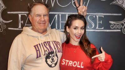 Bill Belichick posing with Jordan Hudson