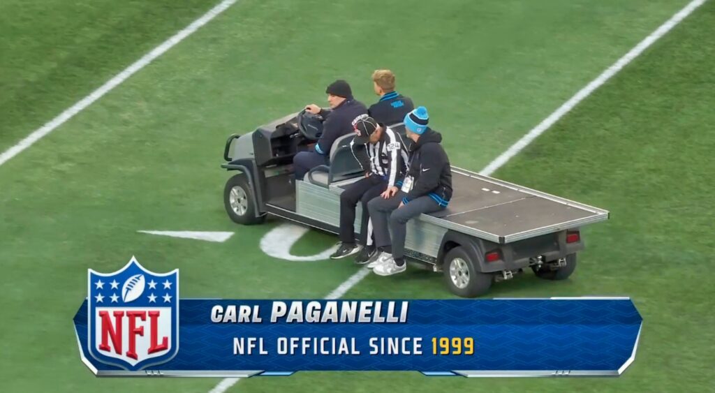 Carl Paganelli getting carted off the field