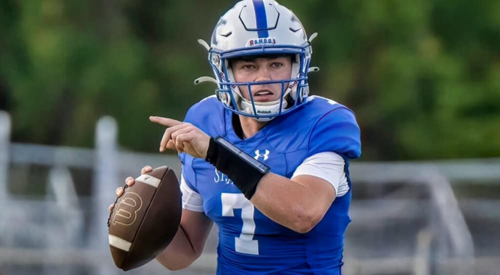 Chase Herbstreit holding football