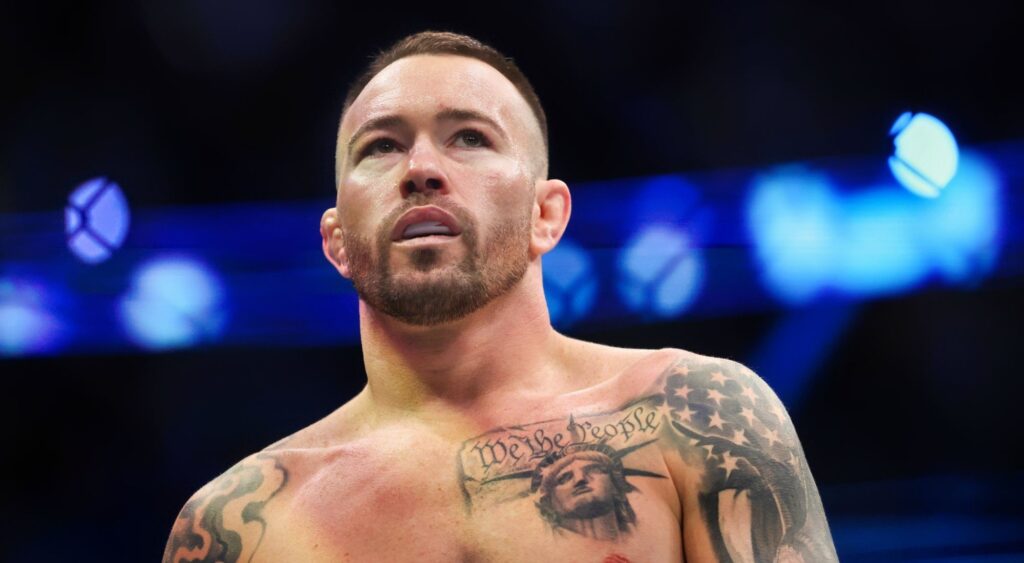 Colby Covington of the United States enters the octagon for a welterweight title fight against Leon Edwards of England during the UFC 296