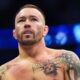 Colby Covington of the United States enters the octagon for a welterweight title fight against Leon Edwards of England during the UFC 296