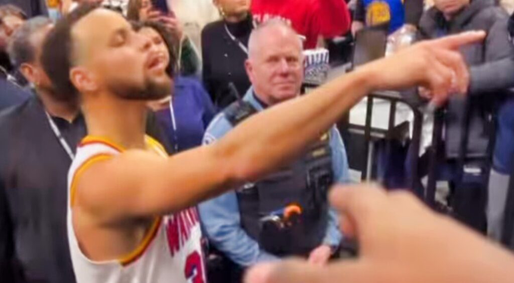 Stephen Curry angrily reacts after an elderly man snatches shoes he gifted to a little kid