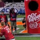 Participant throwing at the Dr. Pepper Halftime challenge