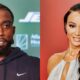 Draya Michele posing and Tyrod Taylor smiling