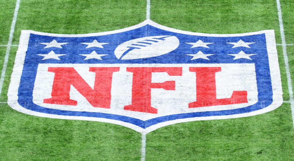 NFL logo shown on field. Eric Ebron announced his retirement.