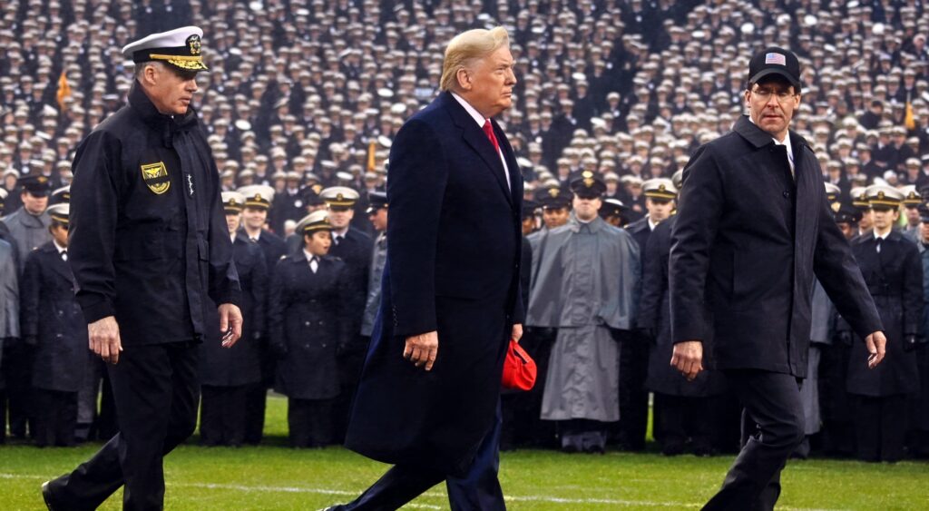 Donald Trump on field at Army vs. Navy game.