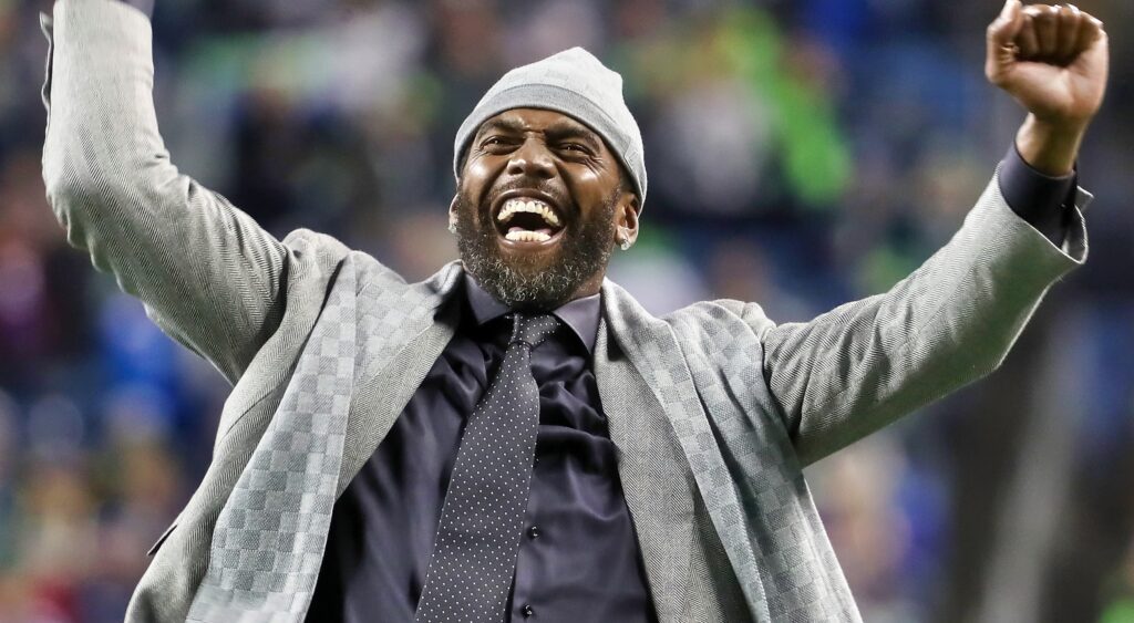 Randy Moss pumping his fists in the air