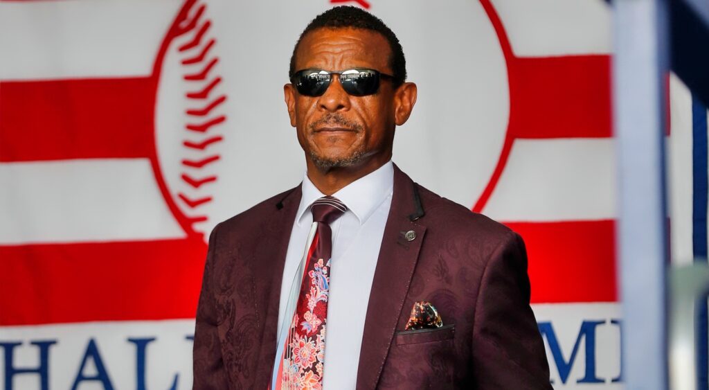 Rickey Henderson wearing suit and tie