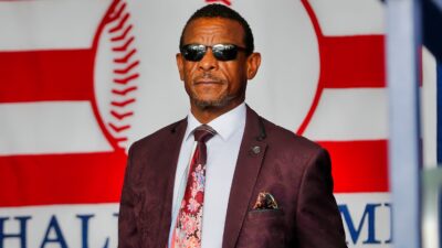 Rickey Henderson wearing suit and tie