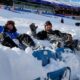 Fans inside Highmark stadium with snow on seats