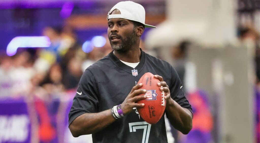 Michael Vick holding a football