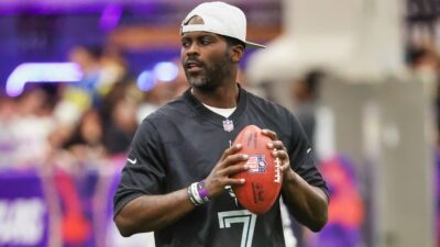 Michael Vick holding a football