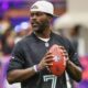 Michael Vick holding a football