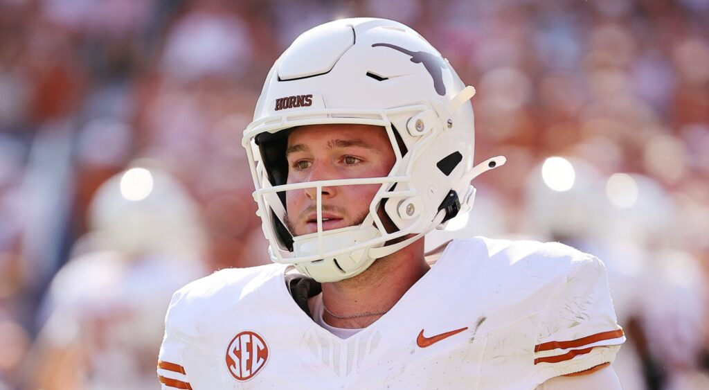 Quinn Ewers of Texas Longhorns looking on.