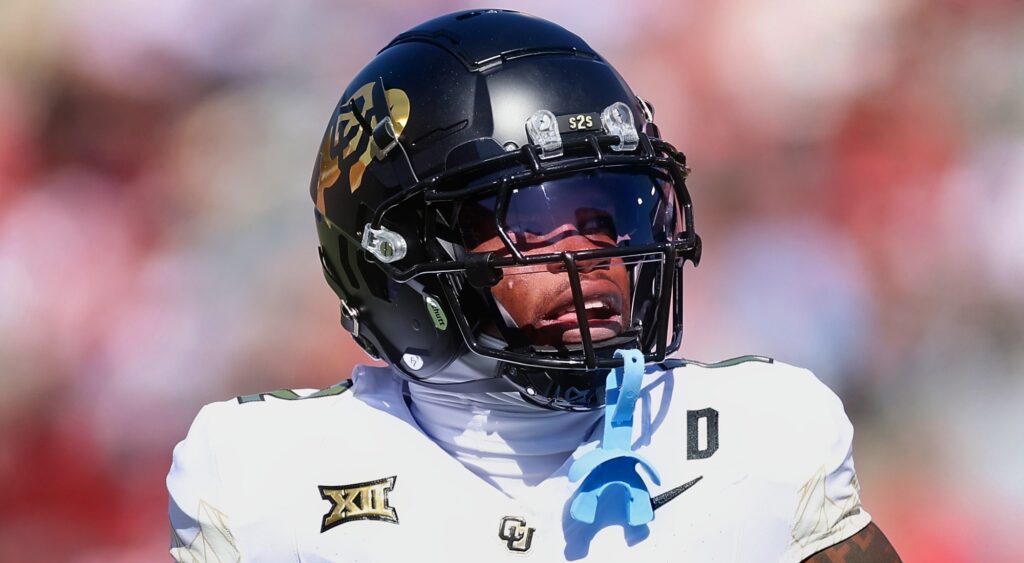 Travis Hunter of Colorado Buffaloes looking on.