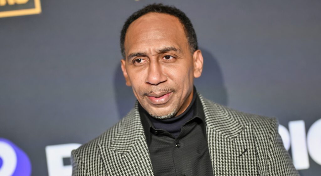 Stephen A Smith posing at event