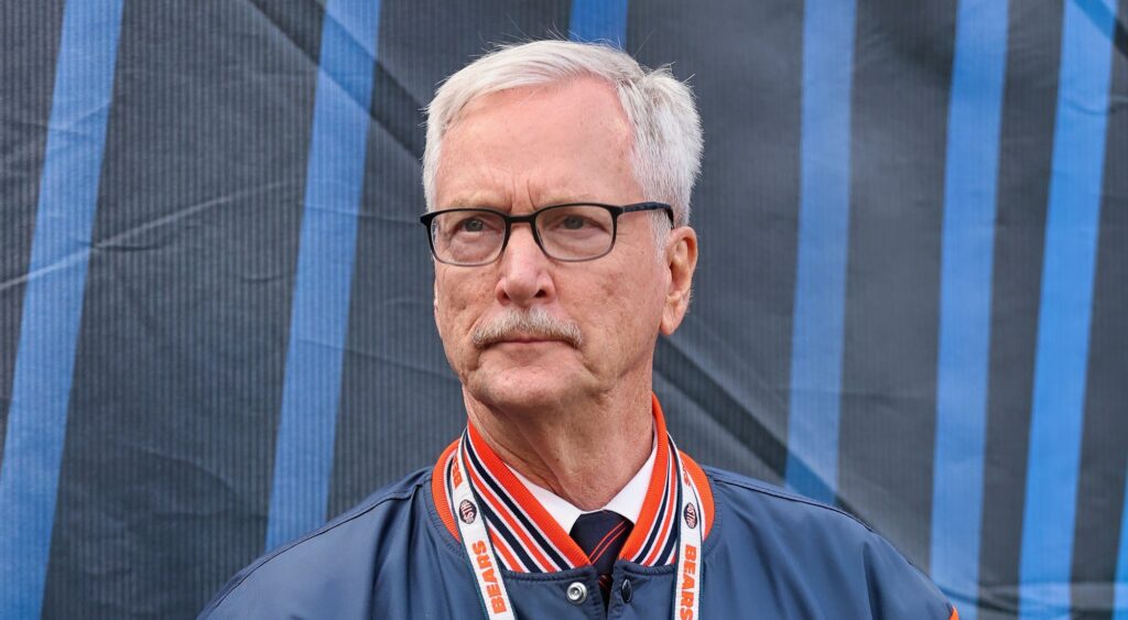 George McCaskey looking on.