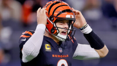 Joe Burrow holding his helmet