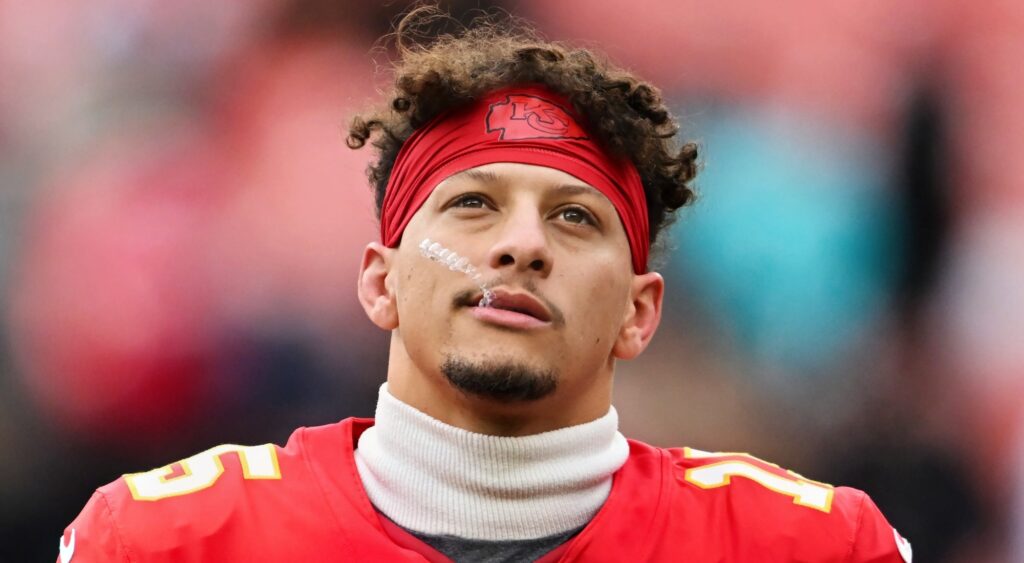 Patrick Mahomes looking on.
