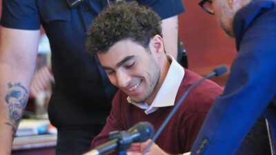 Luigi Mangione smiling