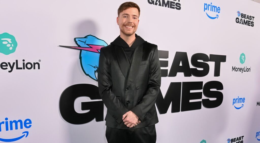 MrBeast posing in black suit