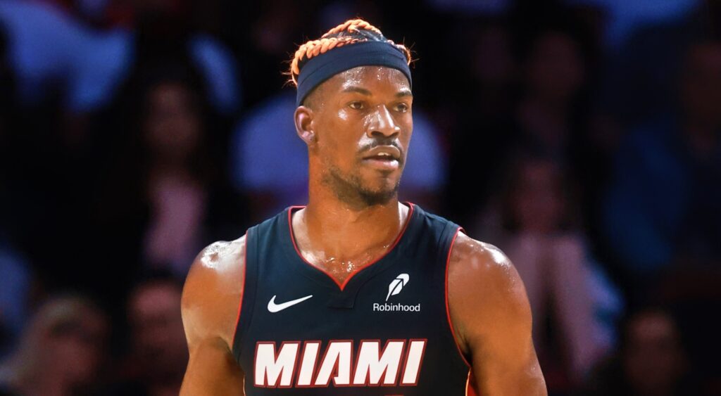 Jimmy Butler of Miami Heat looking on.