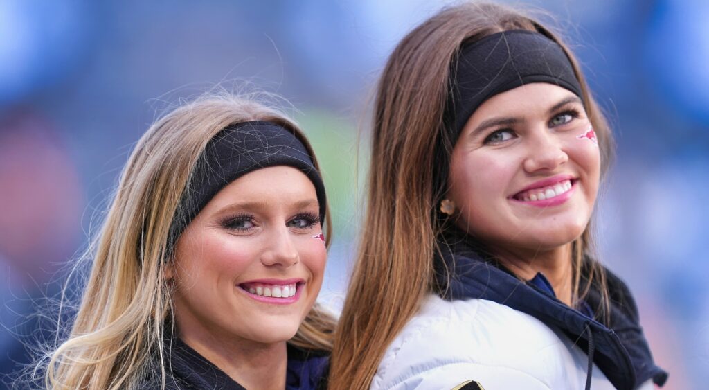 SMU cheerleaders smiling before game vs. Penn State