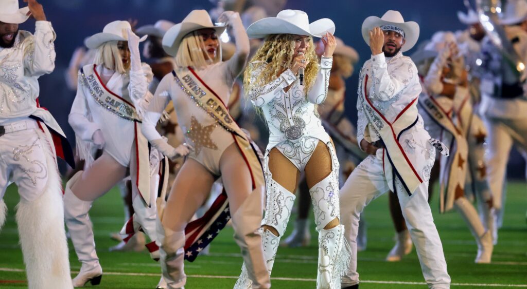 Beyonce performing during halftime show.